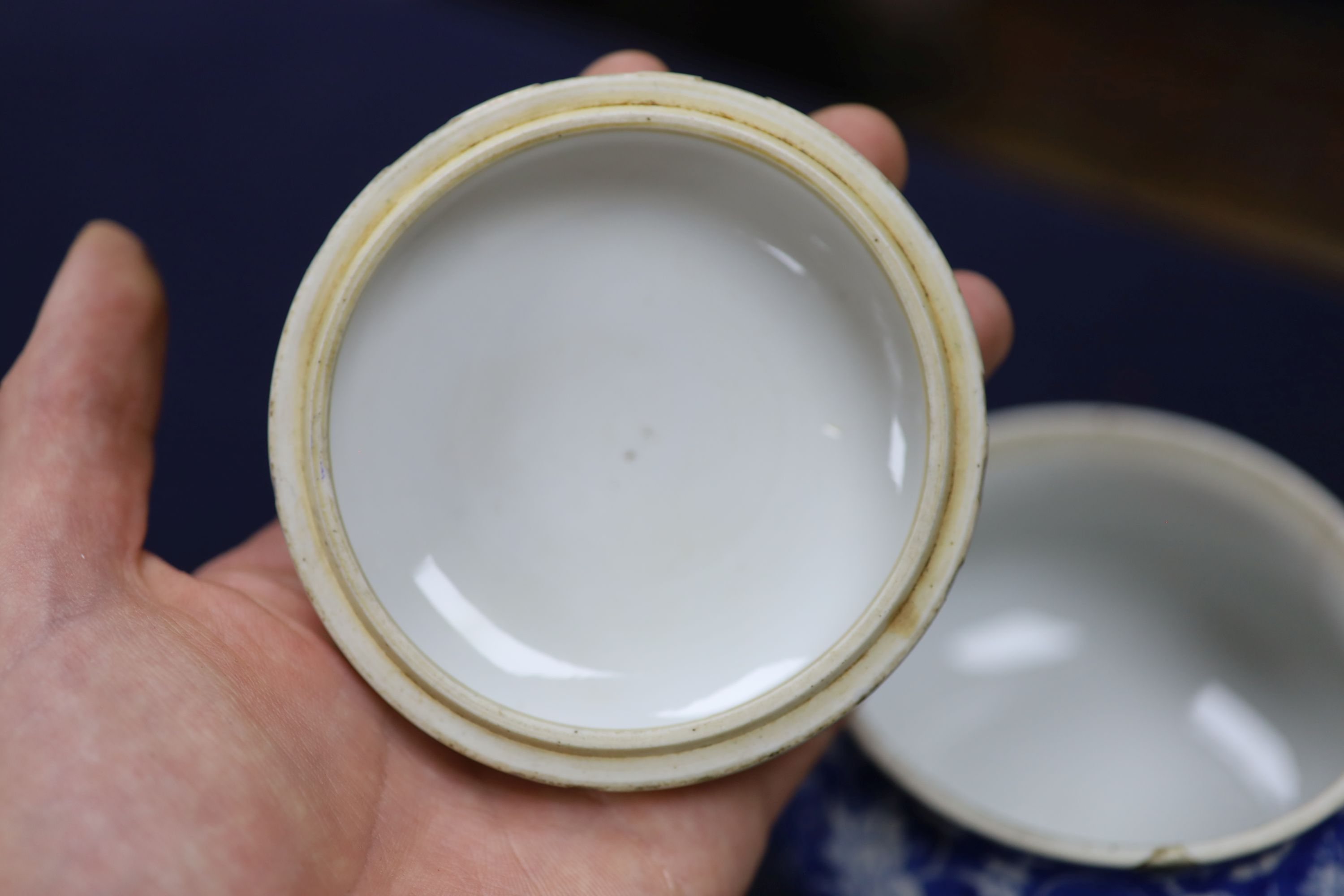 A pair of Chinese blue and white dishes and a similar jar and cover, tallest 12cm